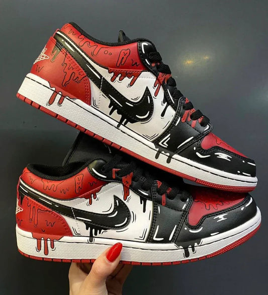 Jordan 1 low goteo rojo